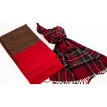 A Paisley shawl, with red border and raw edge, 202cm x 108cm and a red check wool scarf,