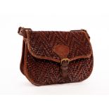 Mulberry, a brown leather woven handbag with shoulder strap, lined with zipped pocket,