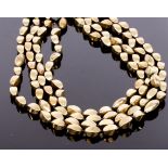 Loulou de la Falaise for Yves Saint Laurent, a gold toned beaded multi-strand necklace,