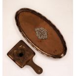Hugh Wallis (1871-1943)/An Arts & Crafts oval copper tray inlaid with white metal fruiting branch