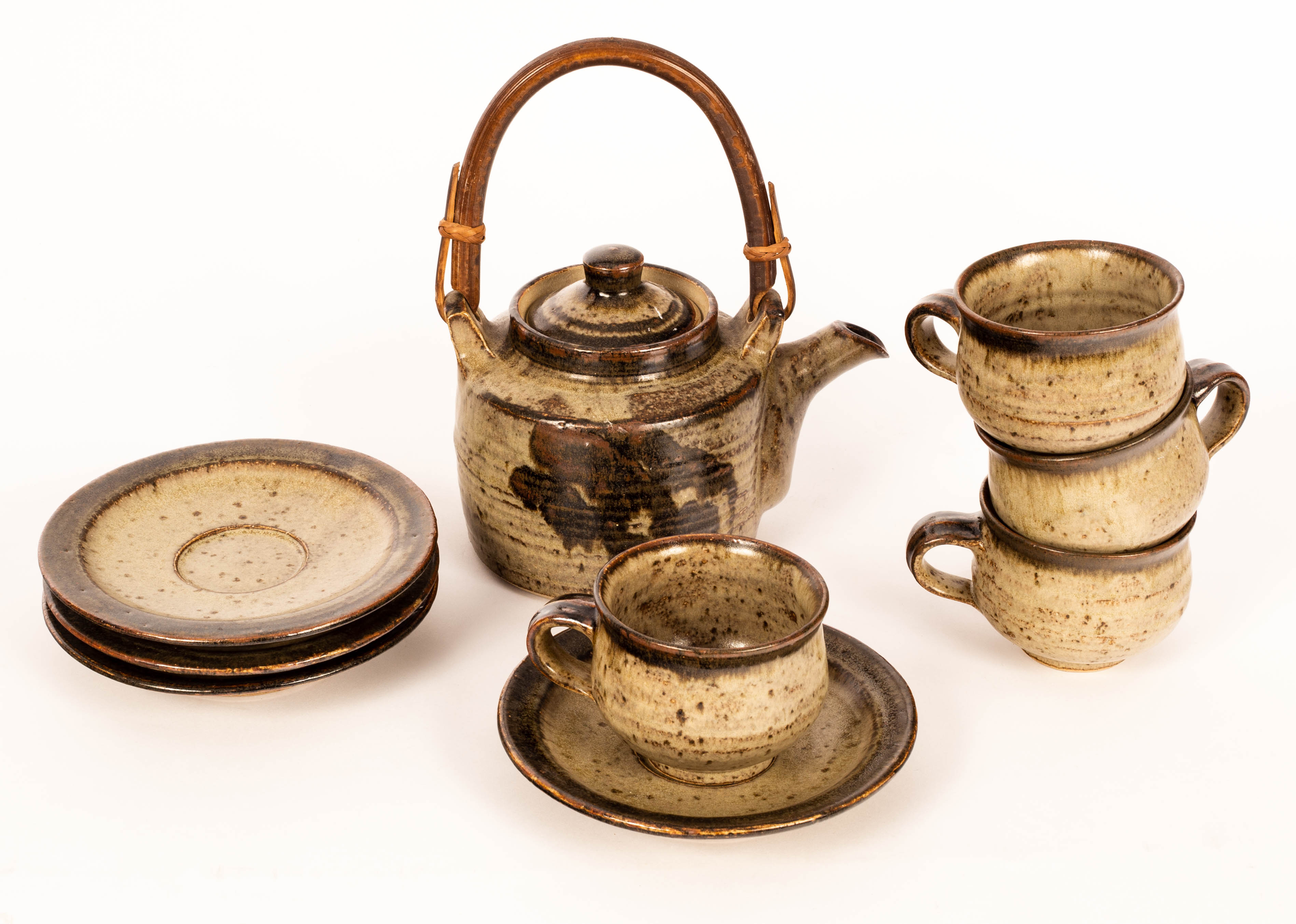 Warwick Parker (born 1940), a stoneware teapot with temmoku and ash glaze, impressed mark,