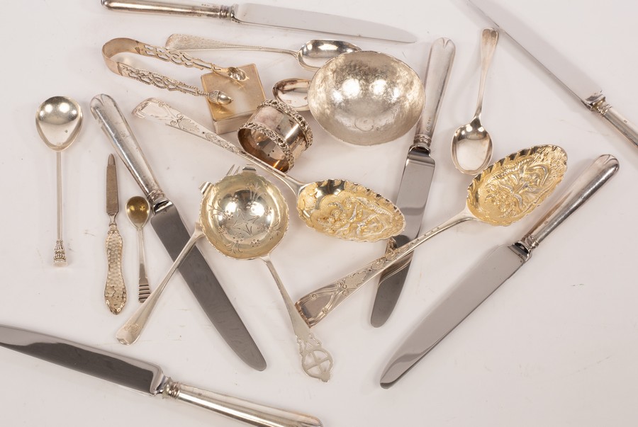 A pair of 18th Century silver spoons embossed fruit at a later date, various silver spoons etc.