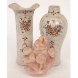 A pink quartz vase decorated flowers in relief and two Chinese vases CONDITION REPORT: