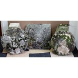 A pair of staddle stones and tops, 67cm high and a square staddle stone top,