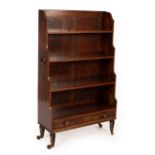 A Regency mahogany crossbanded waterfall bookcase with original handles and later feet, 76.