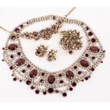 A faux amethyst and diamond costume jewellery necklace and a costume jewellery parure of necklace,