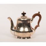 A 19th Century German silver teapot, Mau, Dresden, fitted a carved wood handle,