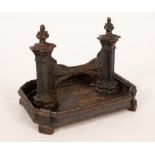 A large 19th Century country house boot scraper with cluster columns and finials