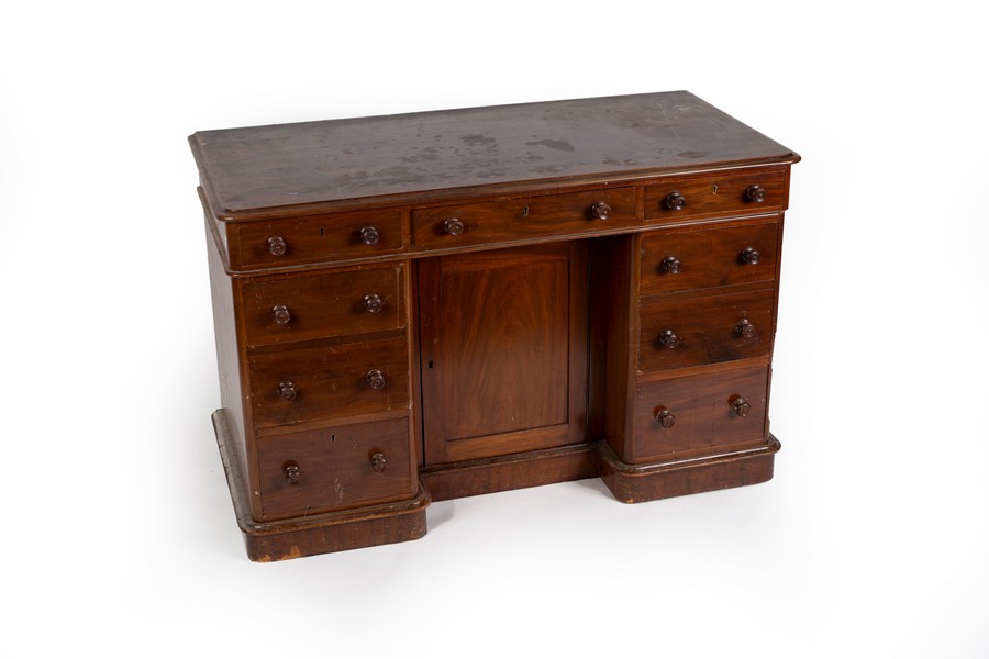 A mahogany kneehole desk fitted a surround of nine drawers and with a central recessed cupboard, - Image 2 of 2