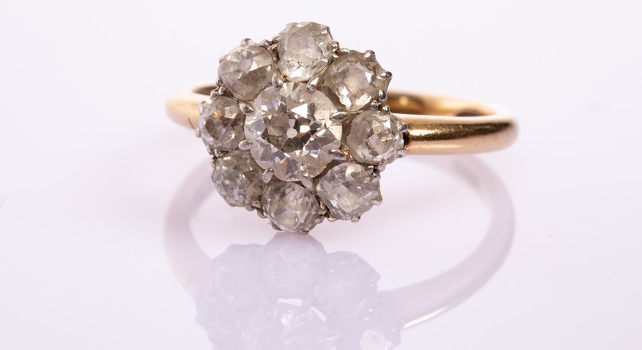 An Edwardian diamond cluster ring,