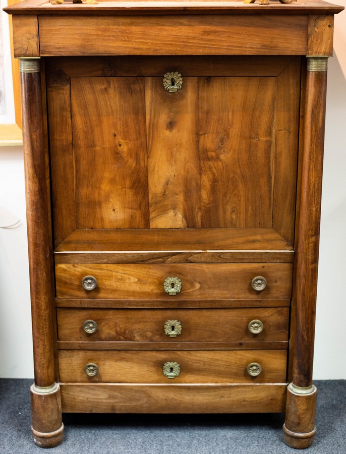 A Regency mahogany escritoire with pillars to the sides,