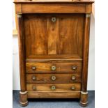 A Regency mahogany escritoire with pillars to the sides,