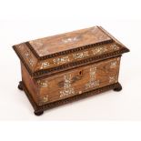 A Regency rosewood sarcophagus tea caddy with knulled borders and inlaid mother-of-pearl