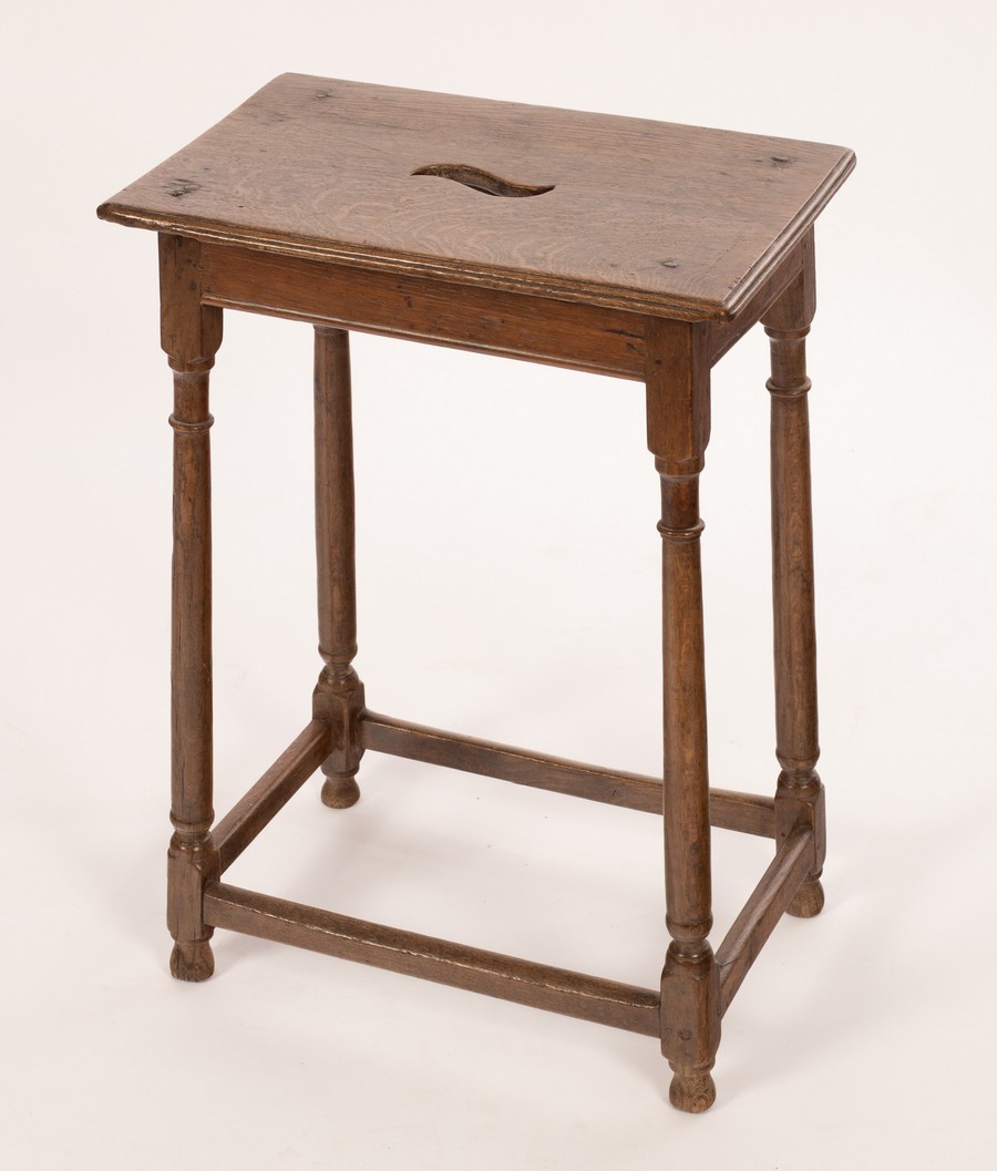 A 19th Century coffin type oak stool,