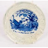 An early 19th Century nursery plate, Dr Syntax Pursued by a Bull, moulded dog,