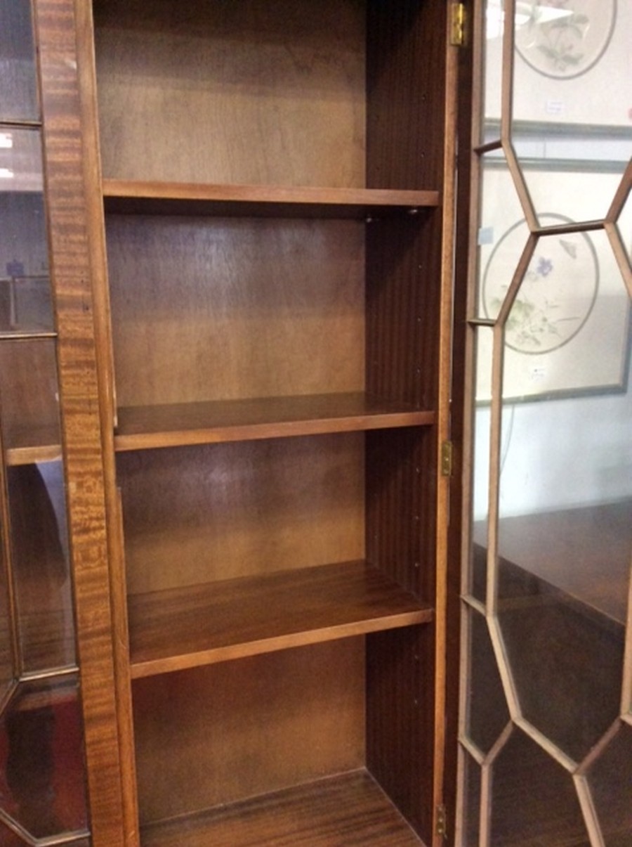 A mahogany breakfront bookcase, the glazed doors with panel doors beneath, - Image 3 of 4