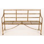 A Regency period reeded garden bench, with lion paw feet, circa 1820,