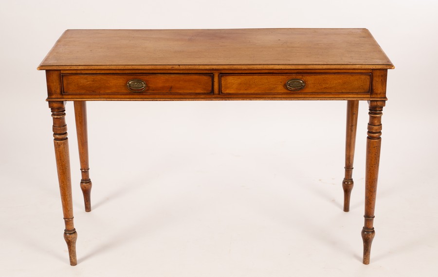 A 19th Century mahogany rectangular table fitted two drawers on turned legs,