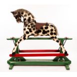 An early 20th Century dapple grey rocking horse with mane and tail (renewed),