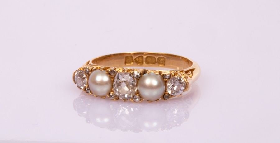 An Edwardian diamond and pearl ring in an 18ct yellow gold scroll setting with hallmarks for - Image 2 of 2