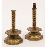 A pair of 18th Century style Dutch brass embossed candlesticks with spiral columns,