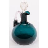 A blue tinted glass claret jug and stopper, 24cm high,