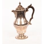 A silver hot water jug, Pearce & Sons, London 1906,