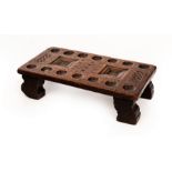 A Sri Lankan early Kandyan period Olinda Kolombuwa board for the game Olinda Keliya,