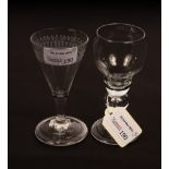 An 18th Century glass, the knopped stem set a teardrop on a circular base with folded foot,