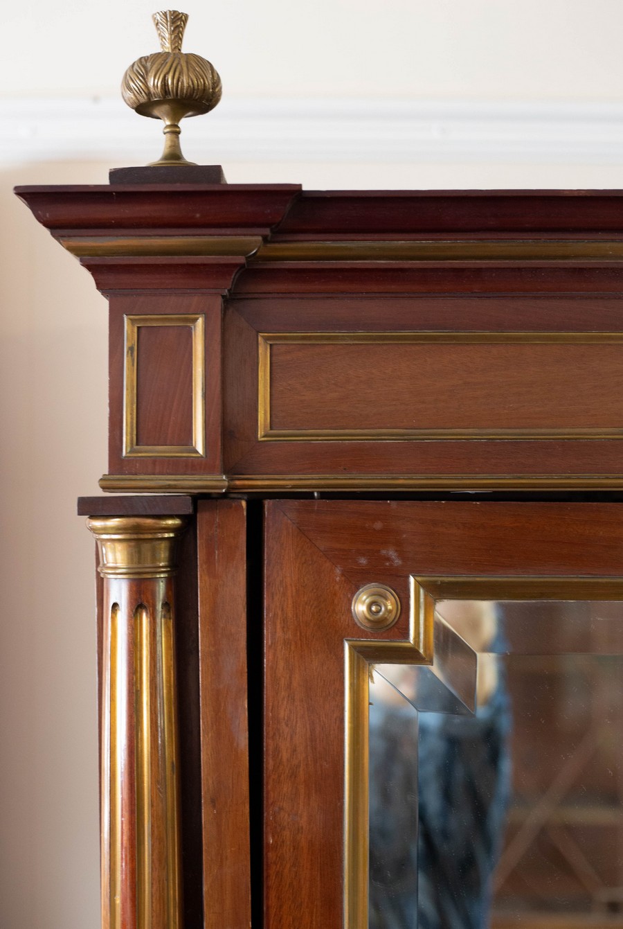 An Empire style parcel gilt wardrobe with gilt brass finials and breakfront cornice, - Image 4 of 7