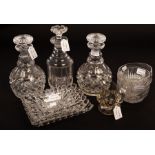 A pair of cut glass decanters and stoppers, various plain finger bowls, cut glass jugs etc.