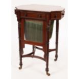 A Regency mahogany work table, central drawer flanked by concealed hinged drawers to each side,