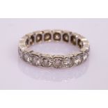 A diamond eternity ring, the nineteen stones with total estimated weight of 2ct, size L,