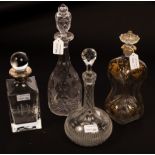 Two Victorian decanters and stoppers with cut and engraved decoration,
