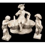 A 19th Century Meissen figural salt and two Berlin figures with astrological symbols for Leo and