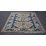 A Kazak carpet of geometric design,