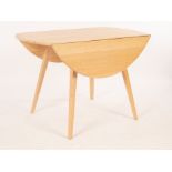 An Ercol dropleaf table,