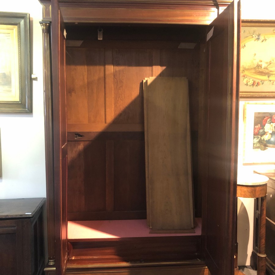 An Empire style parcel gilt wardrobe with gilt brass finials and breakfront cornice, - Image 7 of 7