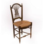 An Arts & Crafts rush seat chair, in the style of Morris & Co.