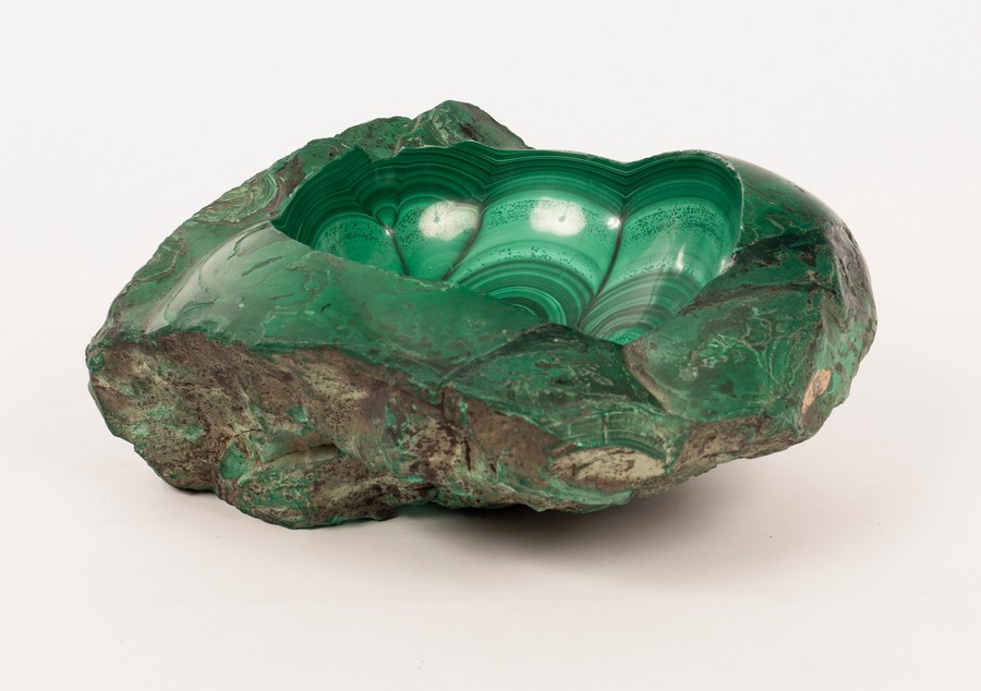 A large malachite bowl, natural stone with polished interior, maximum size 30cm x 28cm, 13cm high,