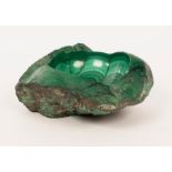 A large malachite bowl, natural stone with polished interior, maximum size 30cm x 28cm, 13cm high,