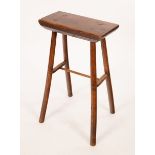 A late 19th Century tall country oak stool with thick slab top and high stretcher,