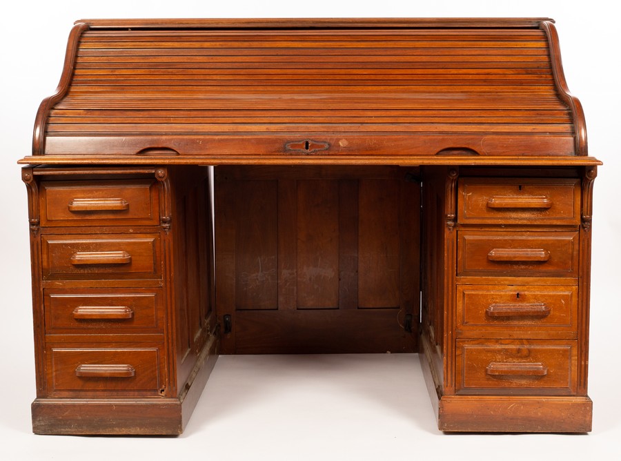 An American roll top desk, fitted two banks of drawers,