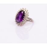 An amethyst and diamond oval cluster ring,