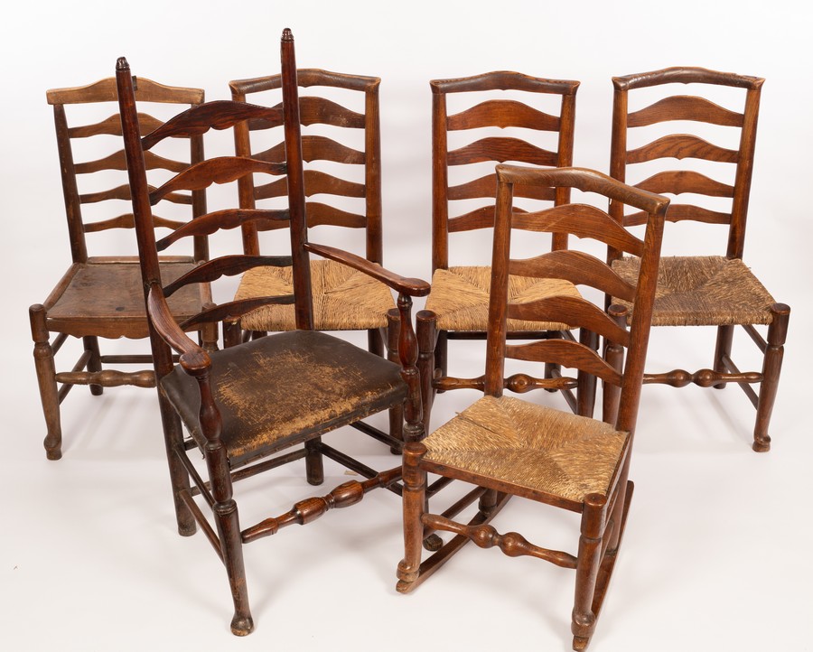 A ladder back armchair and five rush seated ladder back single chairs CONDITION REPORT: