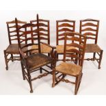 A ladder back armchair and five rush seated ladder back single chairs CONDITION REPORT:
