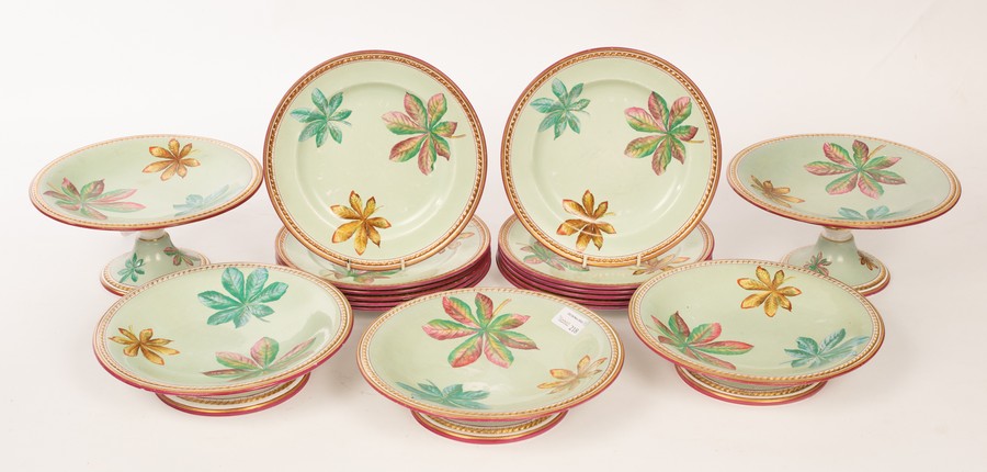 A Minton floral dessert service decorated foliage on an apple green ground,