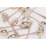 A set of twelve German 800 standard silver teaspoons with beaded edges, monogrammed,