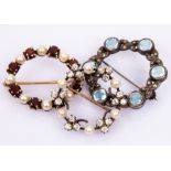 A Victorian diamond and pearl wreath brooch, set with diamond trefoils interspersed by pearls,