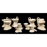 Six Royal Worcester pearlware sweetmeat dishes in the form of a shell with dolphin supports, 11.